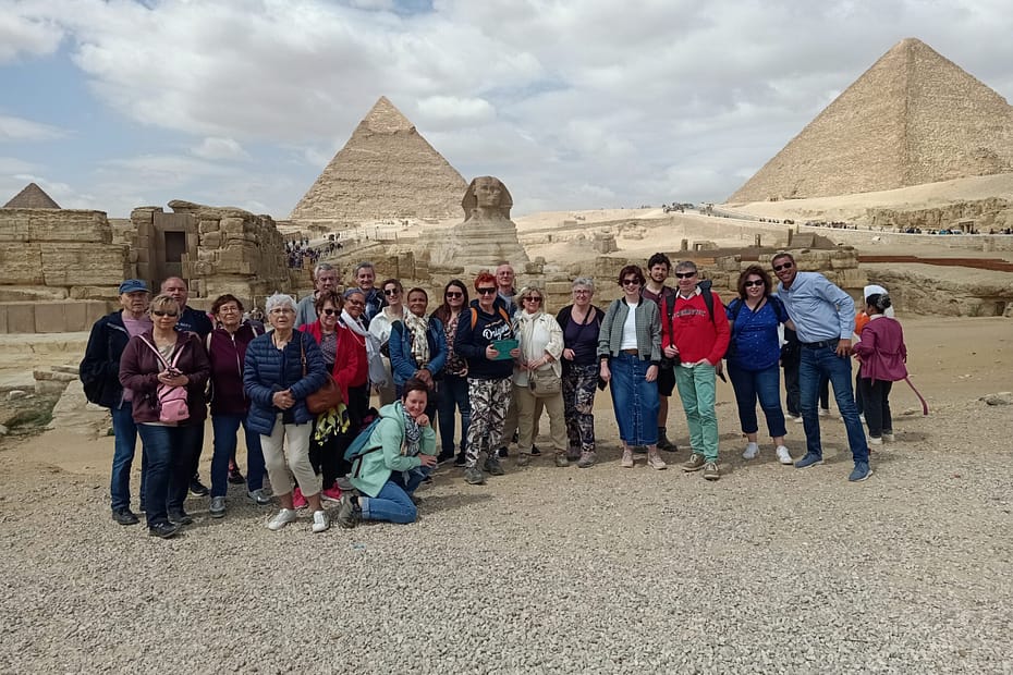 alt="Best Budget-Friendly Egypt Tour - Tourists at the Great Pyramids and Sphinx"